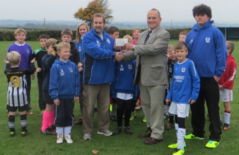 Somerset County Councillor Derek Yeomans with Aller Footballers