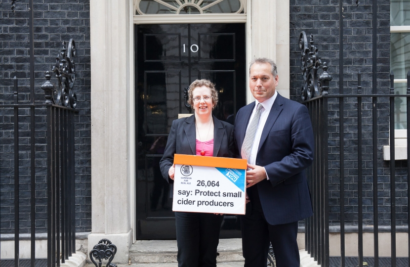 David Warburton MP with Andrea Briers of CAMRA outside Downing Street