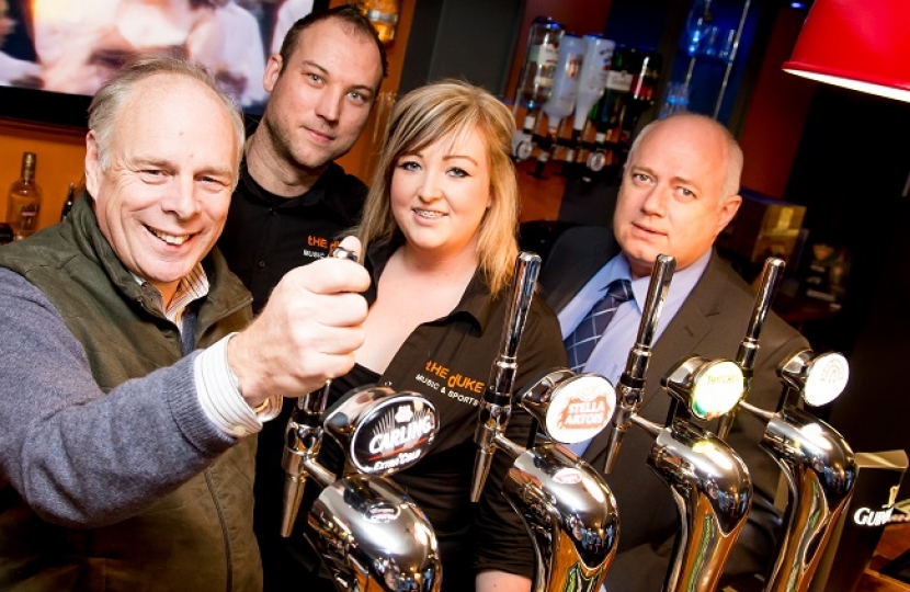 Behind the bar at The Duke is Ian Liddell-Grainger MP