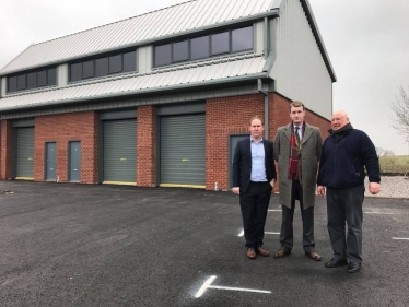 Councillors outside an industrial unit 