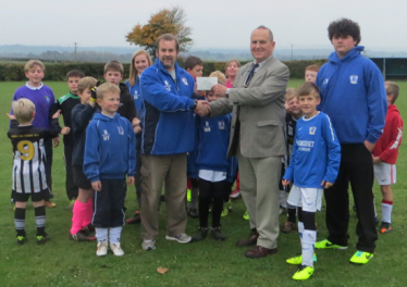 Somerset County Councillor Derek Yeomans with Aller Footballers