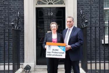 David Warburton MP with Andrea Briers of CAMRA outside Downing Street